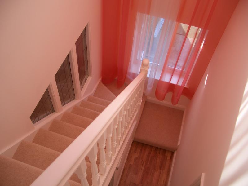White staircase with carpet from MPK Lofts