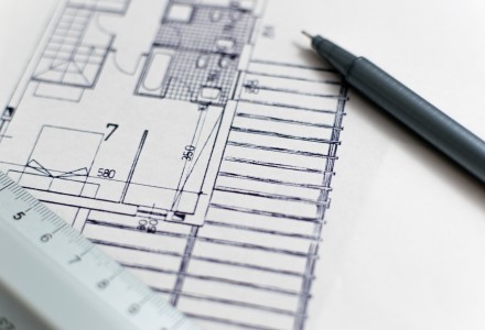 Architecture blueprint with pen and ruler