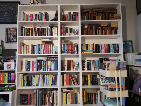 books on bookshelves, book trolley, library